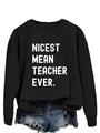Detail of Nicest Mean Teacher Ever slogan print on a black crewneck sweatshirt - S / Black (White Font)