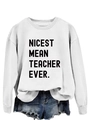 Detail view of Nicest Mean Teacher Ever print on soft white long sleeve sweatshirt - S / White (Black Font)