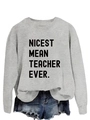 Detail view of the black NICEST MEAN TEACHER EVER lettering on a grey sweatshirt - S / Grey (Black Font)