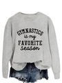 Detail of grey crewneck sweatshirt with 'Gymnastics is my Favorite Season' typography print - Grey Sweatshirt (Black Font)