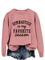 Detail of pink sweatshirt with black 'GYMNASTICS is my FAVORITE season' printed text - Rose Gold Sweatshirt (Black Font)