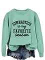 Detail of mint green sweatshirt with Gymnastics is my Favorite Season graphic print - Light Green Sweatshirt (Black Font)
