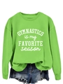 Close-up of green gymnastics long sleeve sweatshirt with white typography print detail - Fluorescent Green Sweatshirt (White Font)