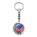 Détail d'un pendentif volleyball rotatif avec drapeau USA sur base en croissant argenté - Volley-ball