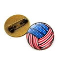 Detail view of American flag volleyball brooch with bronze metal base and safety pin - Bronze-Volleyball