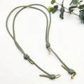 Detail of adjustable bean green leather shoulder strap with gold metal buckles and knots - Gold Ring Buckle / Matcha Green