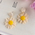 Handmade woven daisy drop earrings with white petals and yellow centers for summer beach vacation - Earring Style (25781)