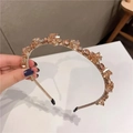 Dettaglio del cerchietto in metallo oro rosa con brillanti cristalli color champagne - Cristallo Champagne (W26)