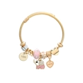 Detalle de elefante esmaltado rosa y corazón en pulsera de cordón trenzado dorado - Rosa