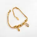 Lussuoso bracciale a catena serpente dorata con perline, ciondoli a occhio e zirconi - Catena a Maglie Con Ciondolo Cilindrico Occhio Blu Stile (0701 G 04A)