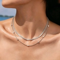 Double-layered silver snake chain necklace with small square beads on model - Steel Color Layered Snake & Cube Bead Chain