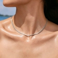 Minimalist silver snake chain necklace in stainless steel worn on female neck at seaside - Steel Color Single Flat Snake Chain