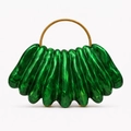 Detail of green marble acrylic wavy evening clutch bag with round gold metal handle - Green