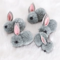 Set of five plush grey Easter bunnies with pink felt ears for DIY craft projects - Gray