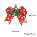 Red Christmas bow hair clip with green glitter tree and snowflake patterns, size 8x8cm - Christmas Tree Hair Clip