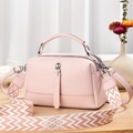 Pink lychee grain leather Boston bag with a wide geometric woven shoulder strap - L24xH14xW10cm / Pink