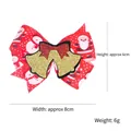 Fermaglio per capelli natalizio con motivi di Babbo Natale e campanellino, largo 8cm - Campanelle di Natale Oro