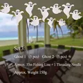 Set decorativo di Halloween con dieci fantasmi in tessuto non tessuto e filo da 33 m - Set 3 (10 Fantasmi con Infilago)
