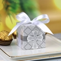 Elegant white cross candy box for weddings with a white satin bow and vintage patterns - Cross and White Ribbon