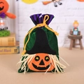 Green velvet Halloween drawstring gift bag featuring a pumpkin with a witch hat - Dark Green Pumpkin Style