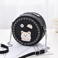 Mini round black chain crossbody bag featuring cute cartoon patches and silver trim - Black