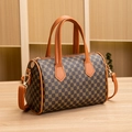 Brown T-monogram Boston cylinder handbag with tan leather handles and gold hardware - Brown