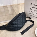 Modern black quilted waist bag with golden zipper and adjustable nylon strap - Black