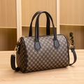 Vintage brown plaid Boston barrel bag with circular patterns and black shoulder strap - Black