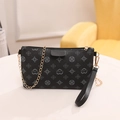 Black leather crossbody bag with geometric prints and detachable gold chain strap - Black
