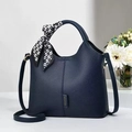 Dark blue pebbled leather bucket bag with geometric silk scarf handle and strap - L24 H22 W9 / Blue