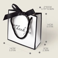 Mini white paper gift bag with black Thank You print and silk ribbon bow 14x14x6cm - Satin Bow Handle Style / White Black Edge