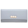 Detail of light blue long leather wallet featuring gold leaf metal charms on the flap - Grey Blue