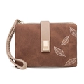 Detail view of the vintage leaf print brown handbag with textured gold metal buckle - Brown