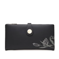 Detail of black long PU leather wallet featuring a printed lotus floral pattern - Black