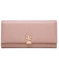 Close-up of pink quilted long wallet featuring a golden flower clasp and logo - Pink