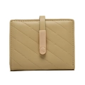Close-up of beige quilted PU leather wallet with elegant gold buckle and stitch detail - Ginger Yellow