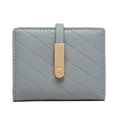 Detail of light blue faux leather wallet with quilted stitching and gold hardware buckle - Sky Blue