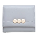 Detail of light blue tri-fold leather wallet with fine grain and golden metal leaf buckles - Grey Blue