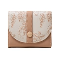 Detailed close-up of metallic snap closure with engraved logo on floral trifold wallet - Orange
