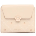 Close-up of quilted floral pattern and metal flower clasp on beige small wallet - Beige Apricot