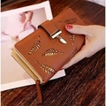 Caramel brown long leather wallet for women with hollow leaf patterns and metal pendant - Brown