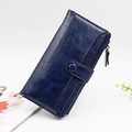 Women's long dark blue PU leather wallet with snap button and zipper closure - Ink Blue