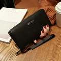 Classic black leather long wallet with wrist strap and zipper closure for women - Black