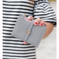 Short grey faux leather wallet for women with pink lining and gold zip closure - Gray