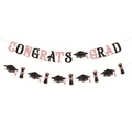 Close-up of rose gold glitter Congrats Grad banner with graduation caps and scrolls - Pink