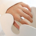 Minimalist T-shape open ring in silver finish with ball detail on model index finger - One Size / Steel