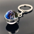 Double-sided glass ball Capricorn zodiac keychain with silver metal ring and starry motif - Capricorn