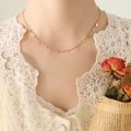 Rose gold choker necklace featuring multiple small solid triangle pendants for women - Rose Gold Triangle Style