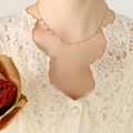 Rose gold minimalist choker with multiple star pendants and polished titanium steel finish - Rose Gold Star Style