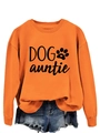 Close-up of orange crewneck sweatshirt with black Dog Auntie text and paw print logo - S / Orange (Black Font)